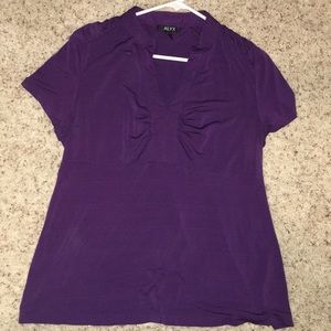 Purple short sleeved v neck blouse